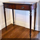 F08. 2-Drawer mahogany side table. 29”h x 30”w x 15”d 